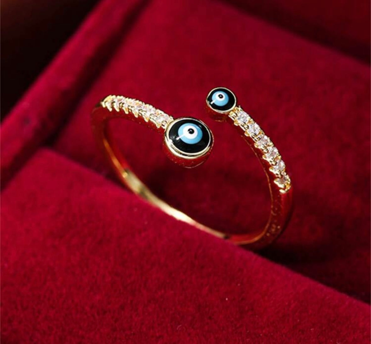 Anillo acero inoxidable ojo turco doble con brillos ajustable